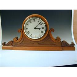 A Victorian mahogany shelf clock with a single fusee movement and scroll work sides, 44cm high...