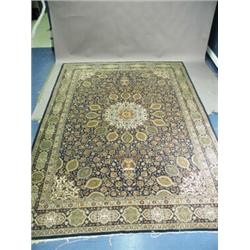 A Tabriz carpet, the blue field with the Ardebil design, with two inner and one outer guard st...