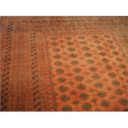 A Bohkara rug with a red ground, 230 x 290cm Est. 200/250...
