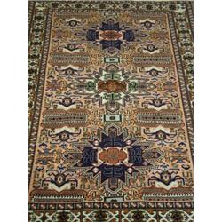 A modern peach ground handmade woollen and part silk Persian Ardebil carpet, 1.48 x 1.00m E...