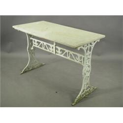 A 19th century cast iron table, the pierced supports with a cast inscription 'Wilkins, Fentonv...