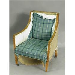 An Edwardian strung satinwood armchair Est. 250/350...