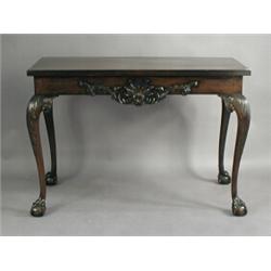 A mahogany serving table on acanthus carved cabriole legs and claw and ball feet, 122cm wide<b...