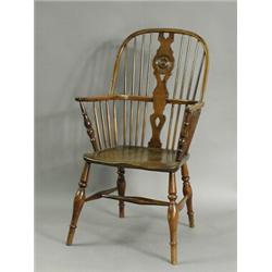 A 19th century yew wood high-back Windsor chair Est. 200/300...