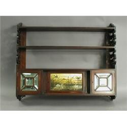 A late Victorian mahogany wall shelf with fret cut ends, a painted panel cupboard door and two...