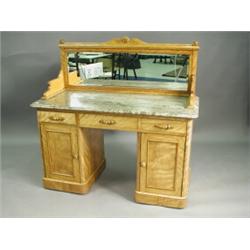 A Victorian satinwood washstand with a mirrored back and marble top, 122cm wide Est. 200/400...