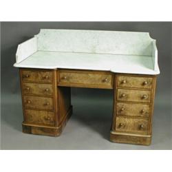A Victorian burr walnut washstand with a white marble top over nine drawers, 129cm wide Est...