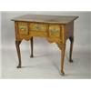 Image 1 : An oak lowboy with three frieze drawers on shaped legs and pointed pad feet, 80cm wide Est....