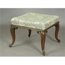 A Victorian mahogany foot stool on moulded cabriole legs Est. 150/250...
