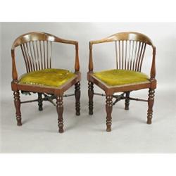 A pair of Edwardian mahogany corner armchairs, with turned legs and 'X' stretchers Est. 320...