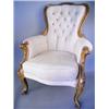 Image 1 : A Victorian easy chair with a foliate carved walnut show frame on scrolling legs, (re-upholste...