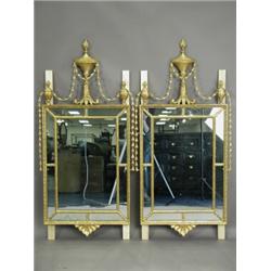 A pair of Adam style mirrors. The main plate surrounded by gilt moulding and segmented mirror...