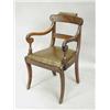 Image 1 : A Regency mahogany elbow chair, with a carved tablet back, on sabre legs Est. 280/320...
