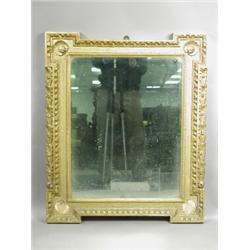 A George II design giltwood mirror, with an egg and dart border and scallop shell designs to t...