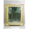 Image 1 : A George II design giltwood mirror, with an egg and dart border and scallop shell designs to t...