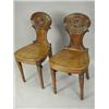 Image 1 : A pair of 19th century mahogany hall chairs, the shaped backs with paterae decoration, on turn...