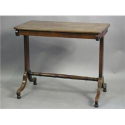 A 19th century mahogany and ebony banded stretcher table with a single frieze drawer and turne...