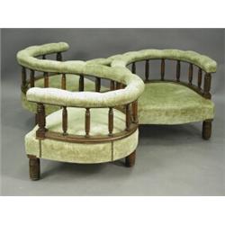 A Victorian walnut conversation seat on spirally turned legs Est. 600/800...