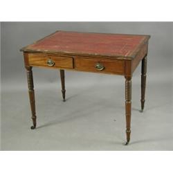 A Victorian mahogany library table with a leather inset over two drawers and dummy drawers on...