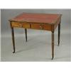 Image 1 : A Victorian mahogany library table with a leather inset over two drawers and dummy drawers on...