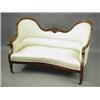 Image 1 : A Victorian mahogany framed two seat settee, with a concave front, on turned tapering reeded f...