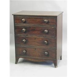 A Georgian mahogany converted box commode chest of four drawers, with knob handles and splayed...