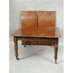 A William IV mahogany extending dining table, the later moulded top with two extra leaves, on...