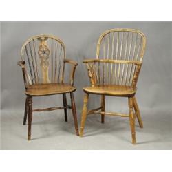 Two 19th century Windsor armchairs, one with a wheelback splat Est. 200/400...