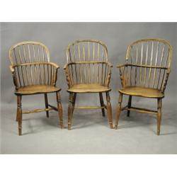 Three various early 19th century Windsor stick and hoop back armchairs, one cut down and vario...