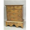 Image 1 : An 18th century low oak chest of drawers, with fielded panelled sides, on a stand with three d...