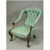 Image 1 : A Victorian rosewood open armchair with carved decoration, (with damage) Est. 200/300...