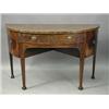 Image 1 : A George III strung mahogany demi lune sideboard with a central drawer and two doors on fluted...