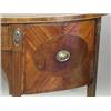 Image 2 : A George III strung mahogany demi lune sideboard with a central drawer and two doors on fluted...