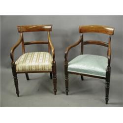 Two similar early 19th century bar back armchairs with overstuffed seats on turned legs Est...
