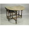 Image 1 : A 17th century oak oval top gateleg table, with a single frieze drawer on turned baluster legs...