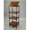 Image 1 : A 19th century mahogany 4 tier whatnot, with an adjustable reading surface, and drawer to the...