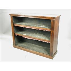 A rosewood open bookcase with two adjustable shelves, 1.3m wide Est. 500/800...