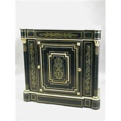 A 19th century French ebonised and brass inlaid side cabinet, with a carved marble top, 108cm wid...