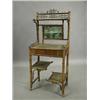 Image 1 : A bamboo washstand with a mirror back a frieze drawer and two undertiers, 57cm wide Est. 80...