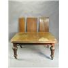 Image 1 : A Victorian mahogany extending dining table, with a moulded top, three extra leaves, with turn...
