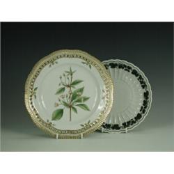 A Royal Copenhagen cabinet plate painted with a specimen within a gilt and pierced border, inscri...