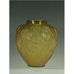 A Sabino amber glass vase moulded with flowering foliage, etched mark to base 'Sabino France' 19c...