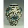 Image 1 : A Burmantofts Faience Persian-style vase of ovoid form, painted with stylised flowers, impressed...
