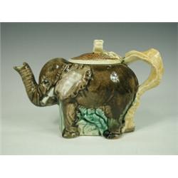A Majolica teapot in the form of an elephant, possibly by Foresters, 19th century, (restuck trunk...