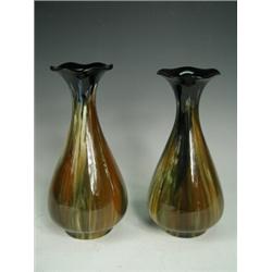 A pair of Bretby pottery vases, with a streaky glaze, impressed Bretby/England 01260, 23cm high E...