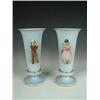 Image 1 : A pair of late 19th century French glass vases, decorated with a Bavarian boy and girl in costume...