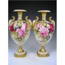A pair of Royal Worcester twin handled vases each with hand painted "Hadley Roses" by William Jar...