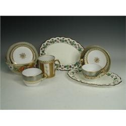 A pair of 19th century Spode silver lustre tea cups and saucers, a gold ground bowl painted with...
