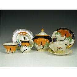 A 7 piece Clarice Cliff "Woodland" pattern solitaire tea set, comprising teapot, sugar bowl, crea...