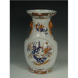 A 19th century Masons Patent Ironstone vase with moulded mask and ring handles, purple printed ma...